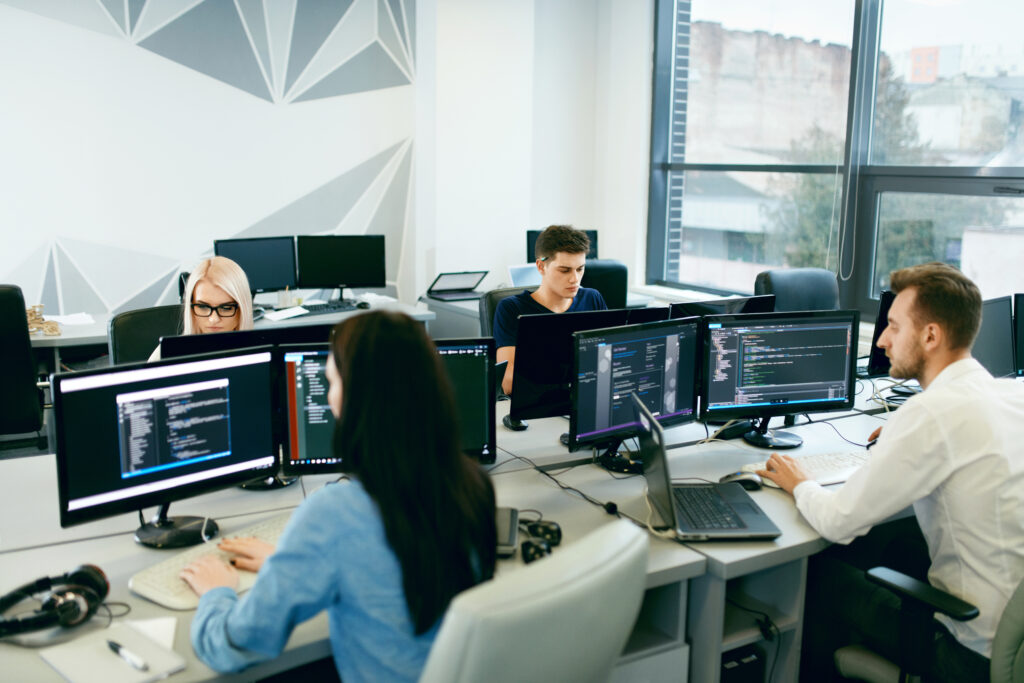 people,working,in,modern,office.,group,of,young,programmers,sitting