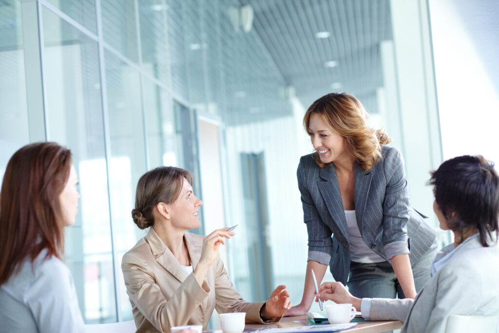 image,of,four,businesswomen,interacting,at,meeting